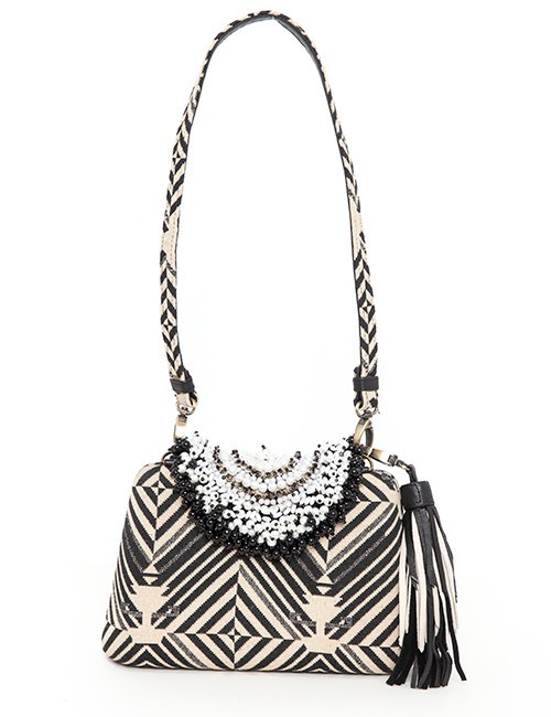 black and cream handbag